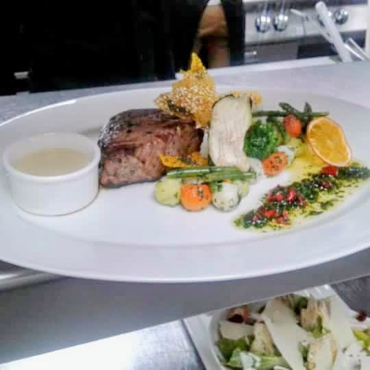A plated entrée ready for service