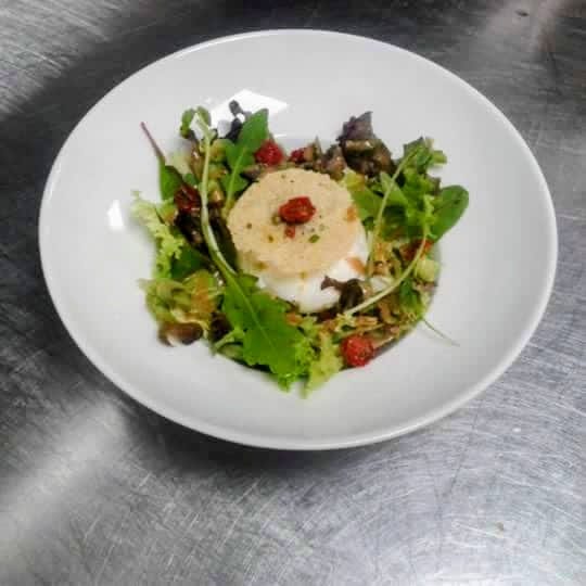 Goat cheese salad, plated in the kitchen